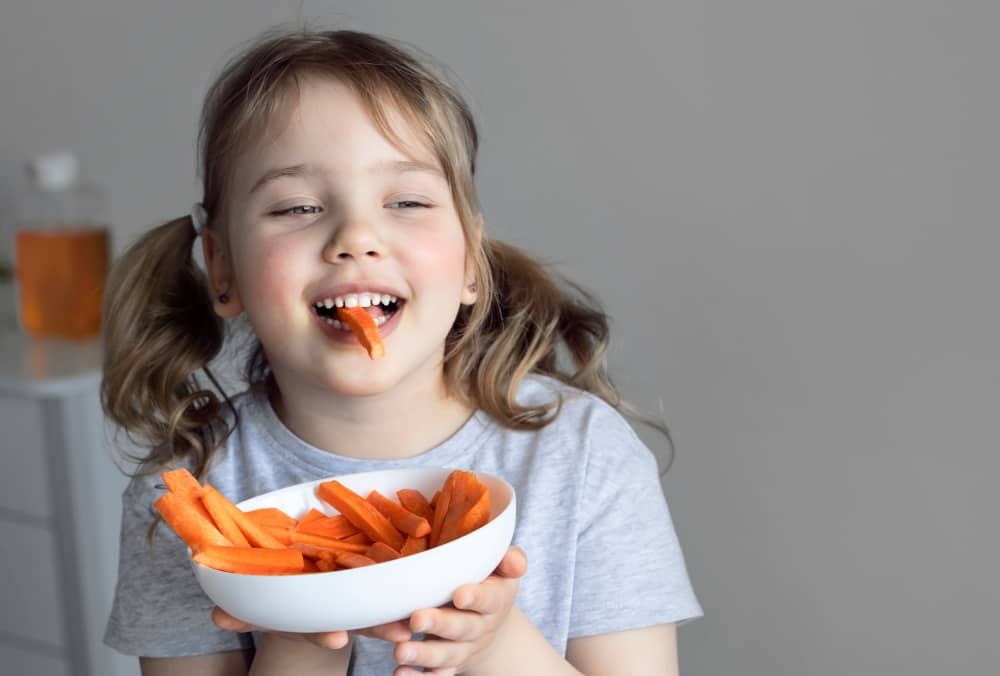 Carrots are packed with essential vitamins and minerals such as vitamin A, vitamin C, potassium, and fiber, which are vital for children's growth and development.